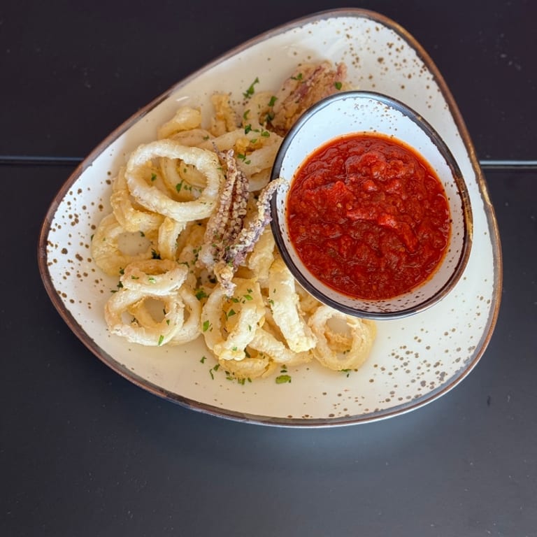 Savor our calamari fritti